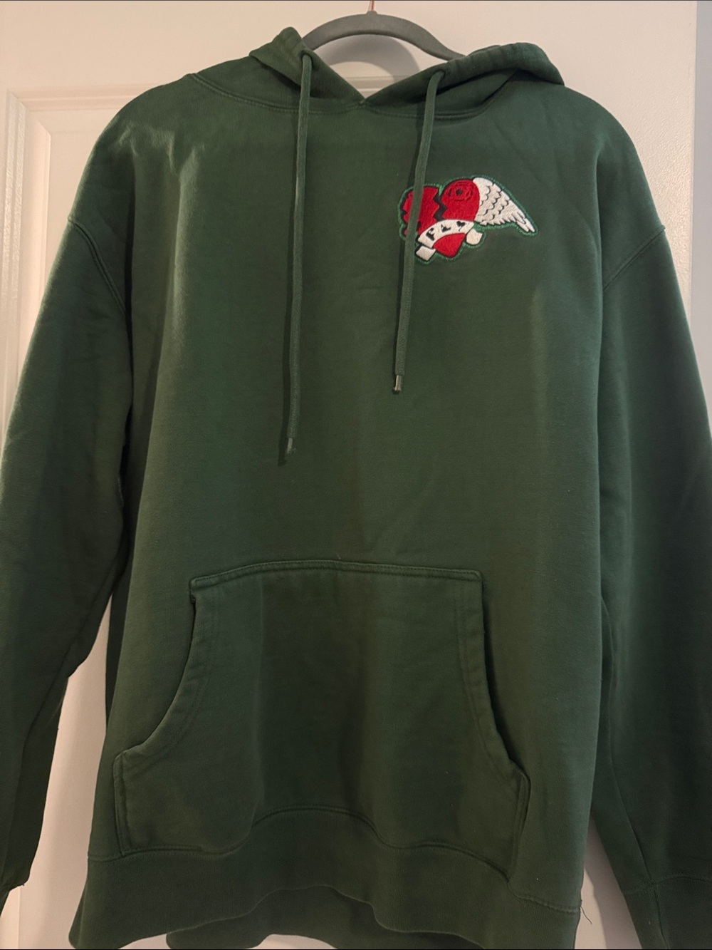 Green Hooded Pullover Sweatshirt with Winged Heart Patch